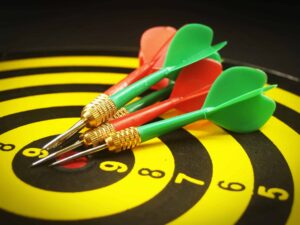 Dart board, symbolizing the precision and focus required to achieve the 10 most important business continuity plan objectives.