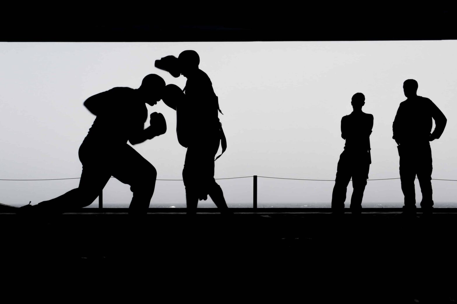 Illustration of two boxers facing off, symbolizing the comparison between Veeam and Datto in terms of backup and disaster recovery solutions.