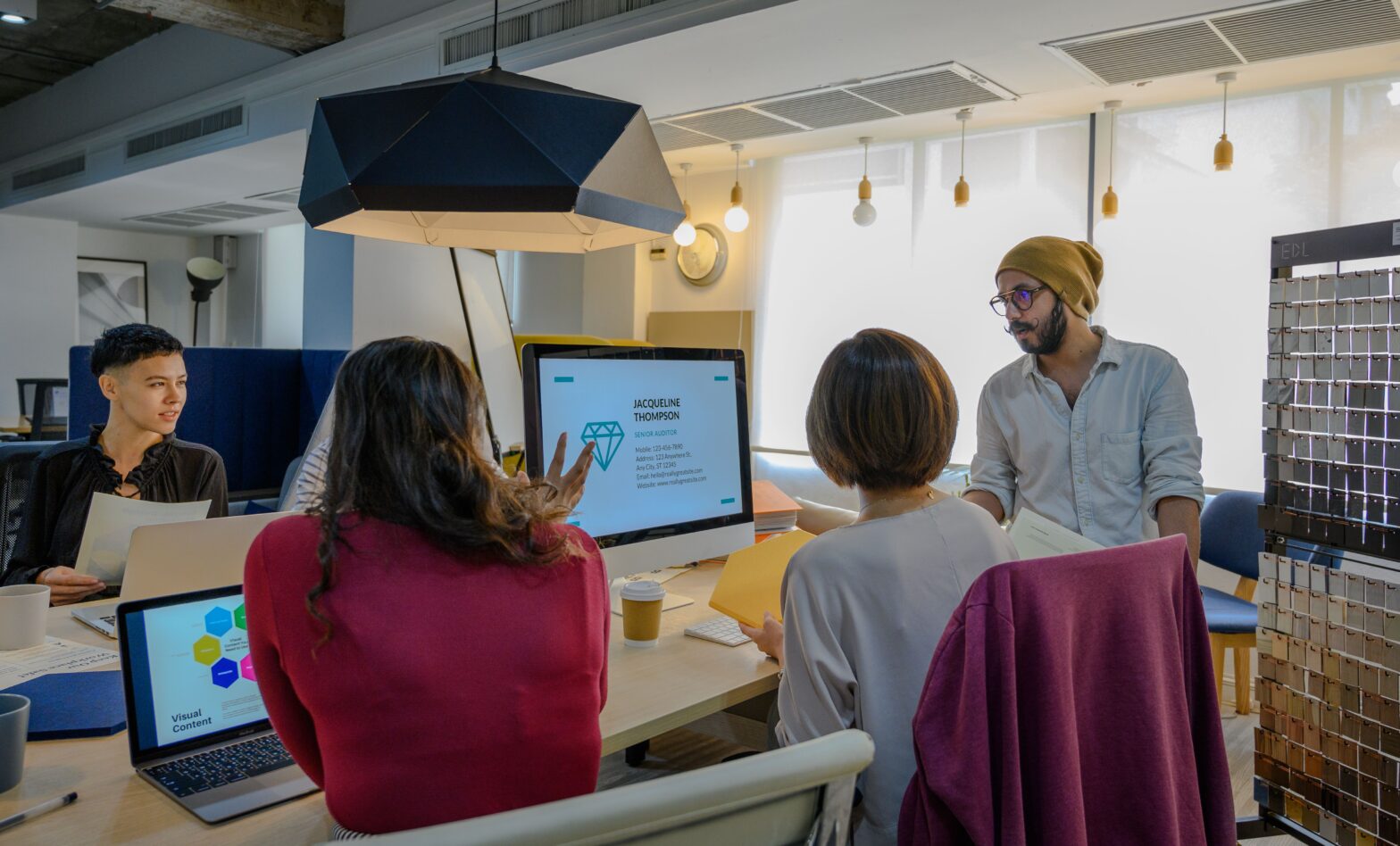 IT team reviewing a business continuity and disaster recovery plan before an outage.