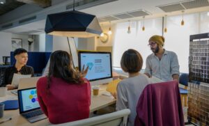 IT team reviewing a business continuity and disaster recovery plan before an outage.