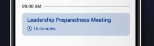 Phone screen showing meeting notification to discuss business continuity questions for Leadership.